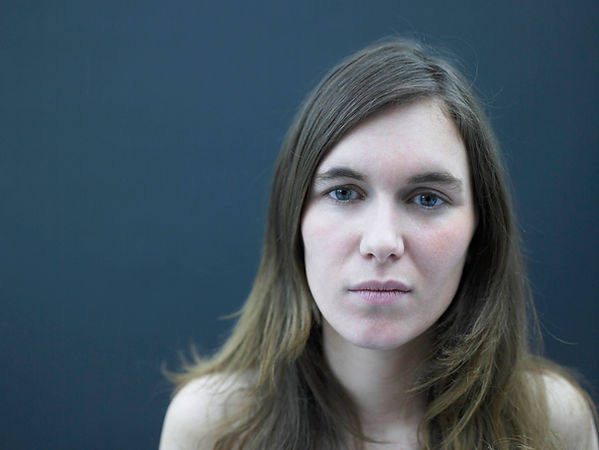 depressed woman looking out of the picture