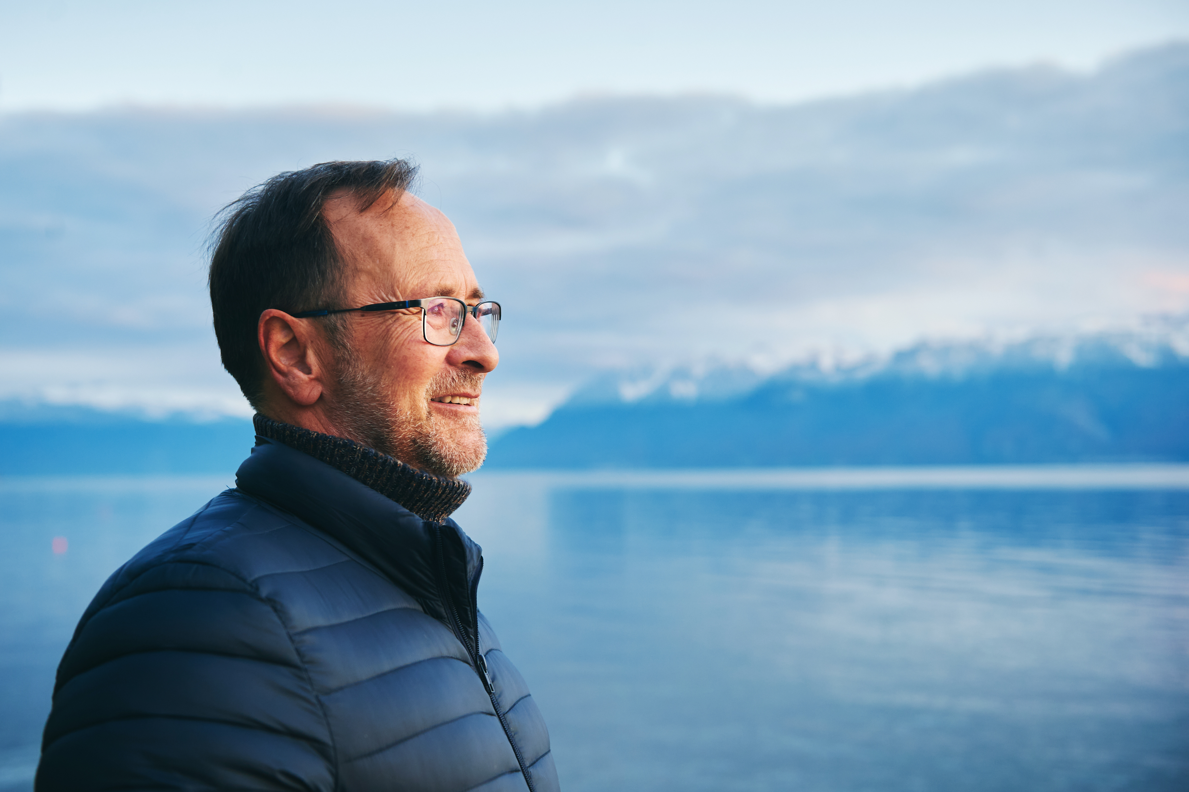 Person with lake in background
