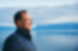 Person with lake in background