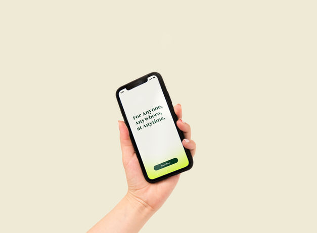 Hand holding phone showing "Free App, Less Worry, Less Mess"