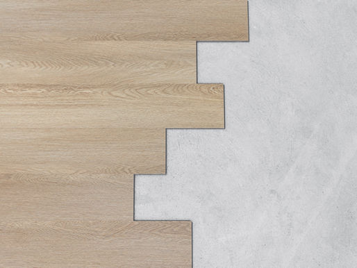 Side-by-side view of a warm wooden floor and a sleek cement floor, illustrating flooring options during a home remodel.