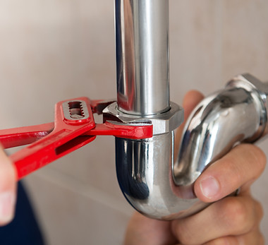 Plumber Fixing Pipes