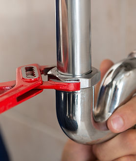 Plumber Fixing Pipes