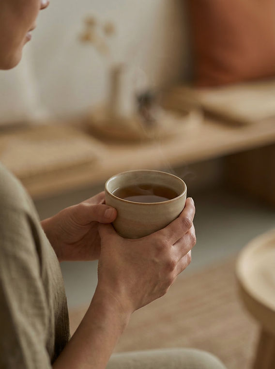 Hands Holding Mug