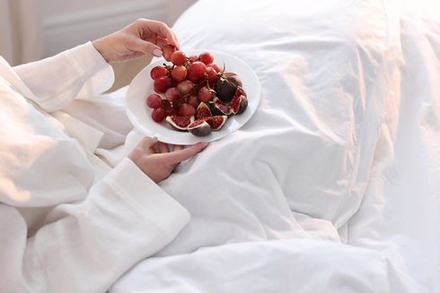 Woman Holding Grapes