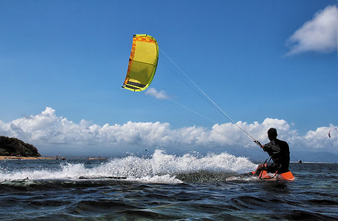 Kitesurfer On Waves