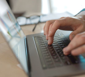 Typing on Laptop