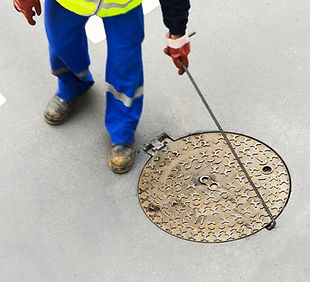 Opening Sewerage Hatch
