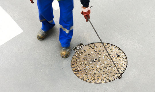 Opening Sewerage Hatch