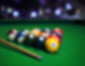 Billiard balls in a green pool table