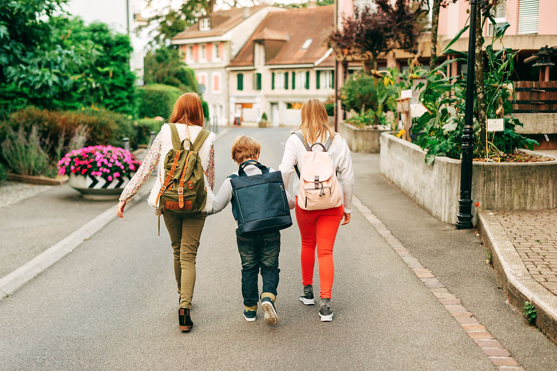 People walking with backpacks