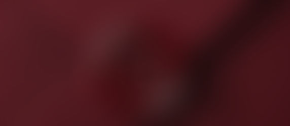 A red envelope with a wax seal featuring a stylized rose design. The envelope is closed, displaying a formal, elegant mood.