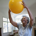 Woman Holding Exercise Ball