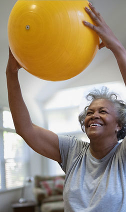 Woman Holding Exercise Ball