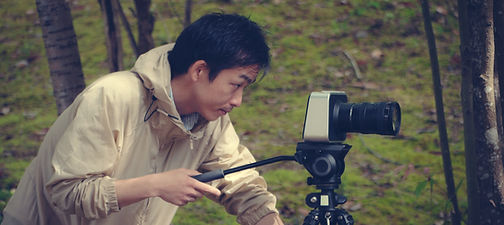 Photographer Using Tripod