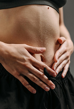 Hands on Stomach