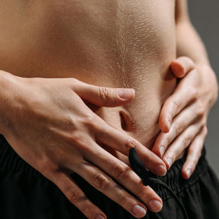 Hands on Abdomen
