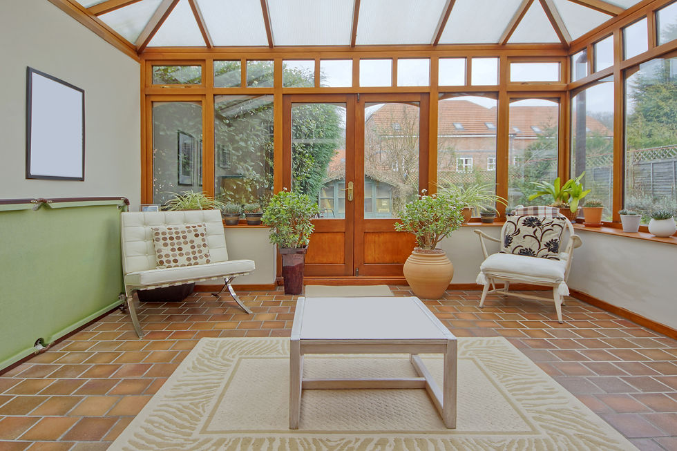 conservatory tables chairs plants room in house next to garden
