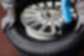 Mechanic changing car tire