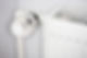 Thermostatic radiator valve attached to a white radiator
