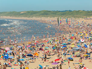 Busy Beach during heatwave.