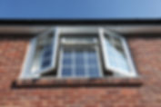 An open doubled glazed bedroom window