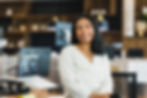 Happy management woman in an office setting
