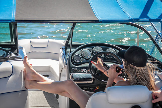 Person Driving Boat