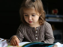 Child Reading Book