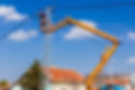 Worker on electrical pole