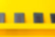 Books on a Yellow Wall