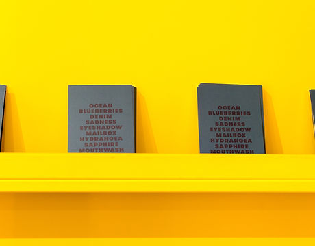 Books on a Yellow Wall