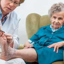 A doctor helping with elderly care