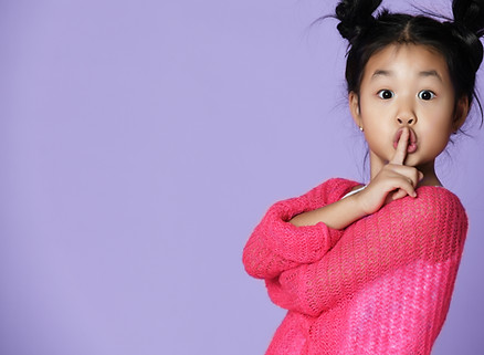 Girl Making Shushing Gesture