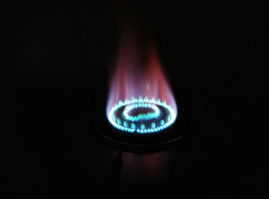 Gas Stove Burner Against Black Background