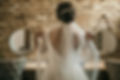Bride adjusting wedding veil