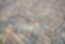 Close up of concrete block pattern of the pavement in urban street background