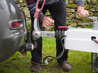 Hooking up the caravan ready for towing