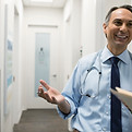 Smiling doctor in hallway