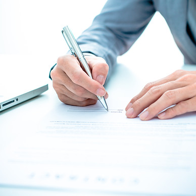 Business man signing a contract