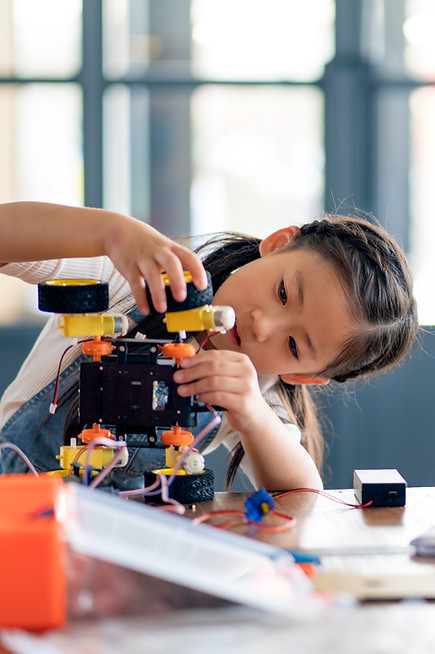 Girl Building Robot