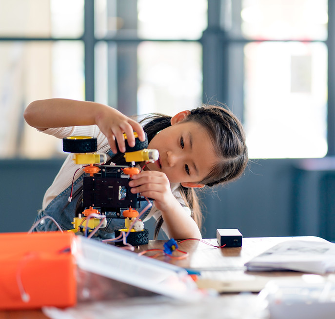 Girl Building Robot