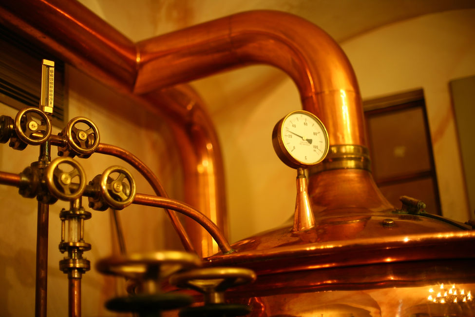 Close up of vintage copper boiler valves and pressure gauges in Kettering