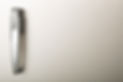 A sleek, silver refrigerator door handle