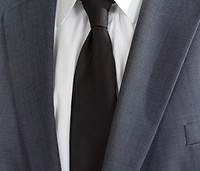 Suit jacket and black tie