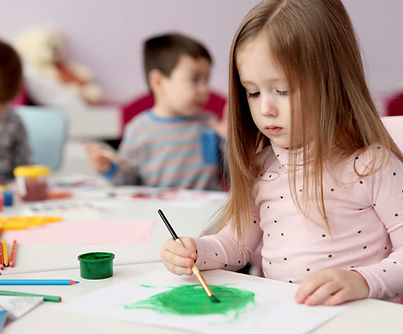 Girl Painting with Brush