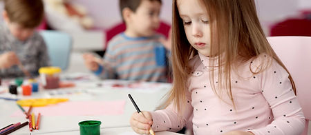 Girl Painting with Brush