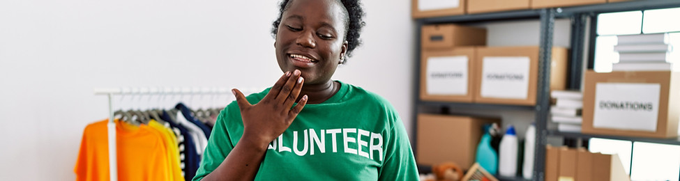 Volunteer Using Sign Language