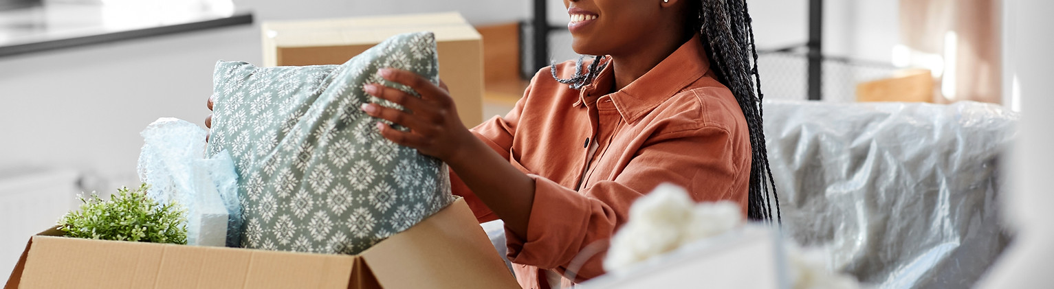 Woman Unpacking Boxes