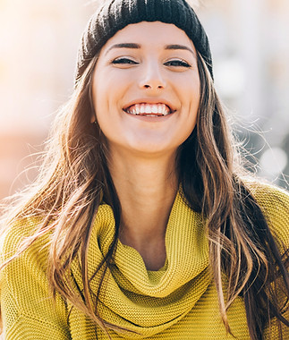 Portrait of a young woman, smiling outdoor